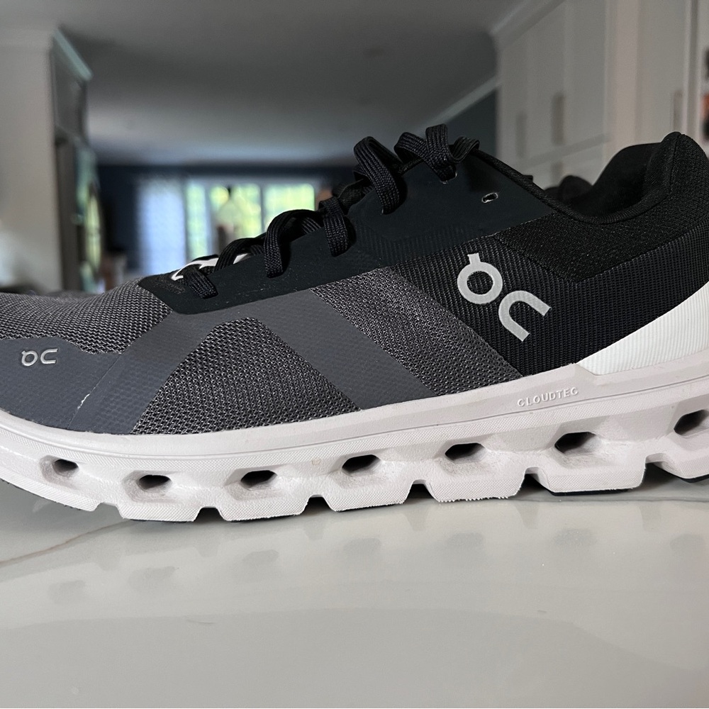 On Running Black and Gray Athletic Shoes with Cloud Cushioning